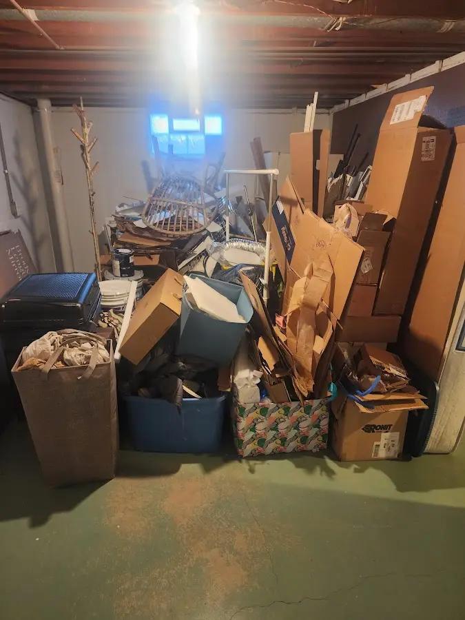 Roll-off dumpster container at job site for 2 Yard Dumpster Rental in Chain Lake